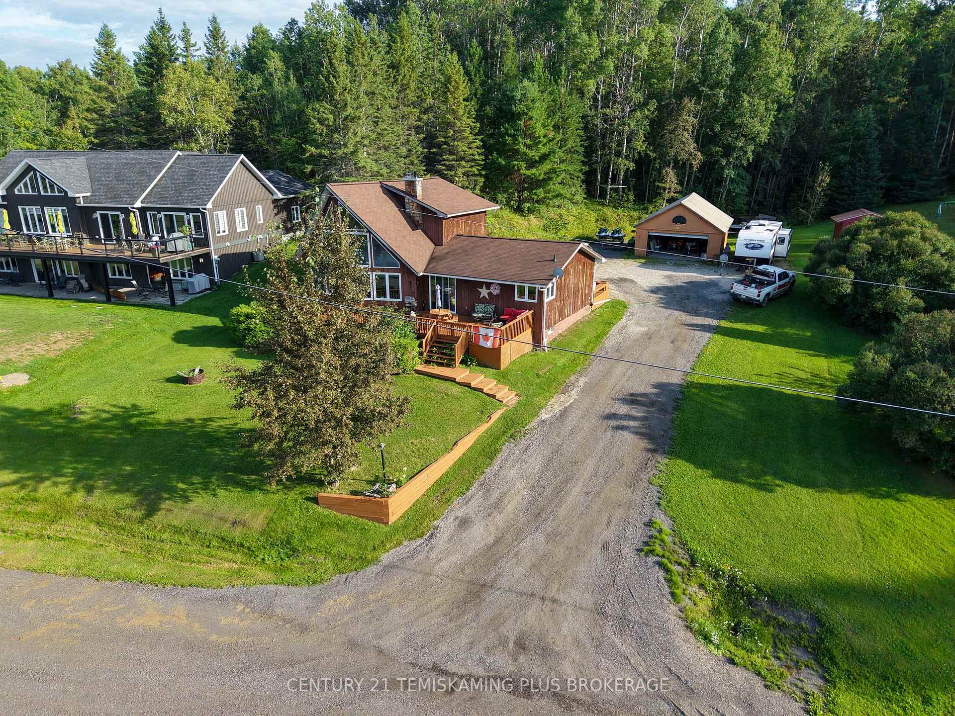 Photo 2 of 65 Lakeshore Avenue, Englehart, Central Timiskaming — HOMEH