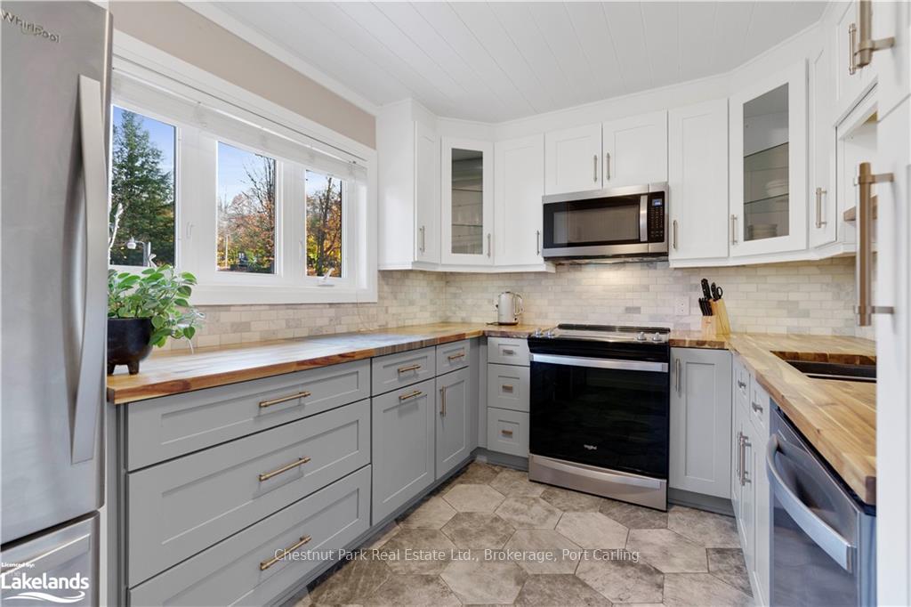 Photo 6 of Unit 7, 39 Southbank Drive, Bracebridge — HOMEH