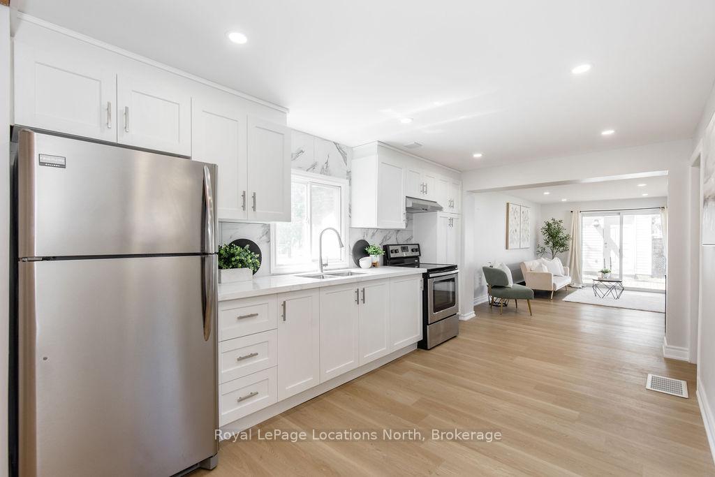 Photo 4 of 56 68th Street N, Wasaga Beach — HOMEH