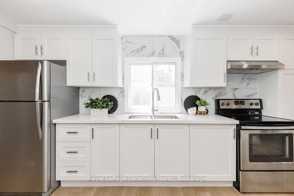 Photo 5 of 56 68th Street N, Wasaga Beach — HOMEH