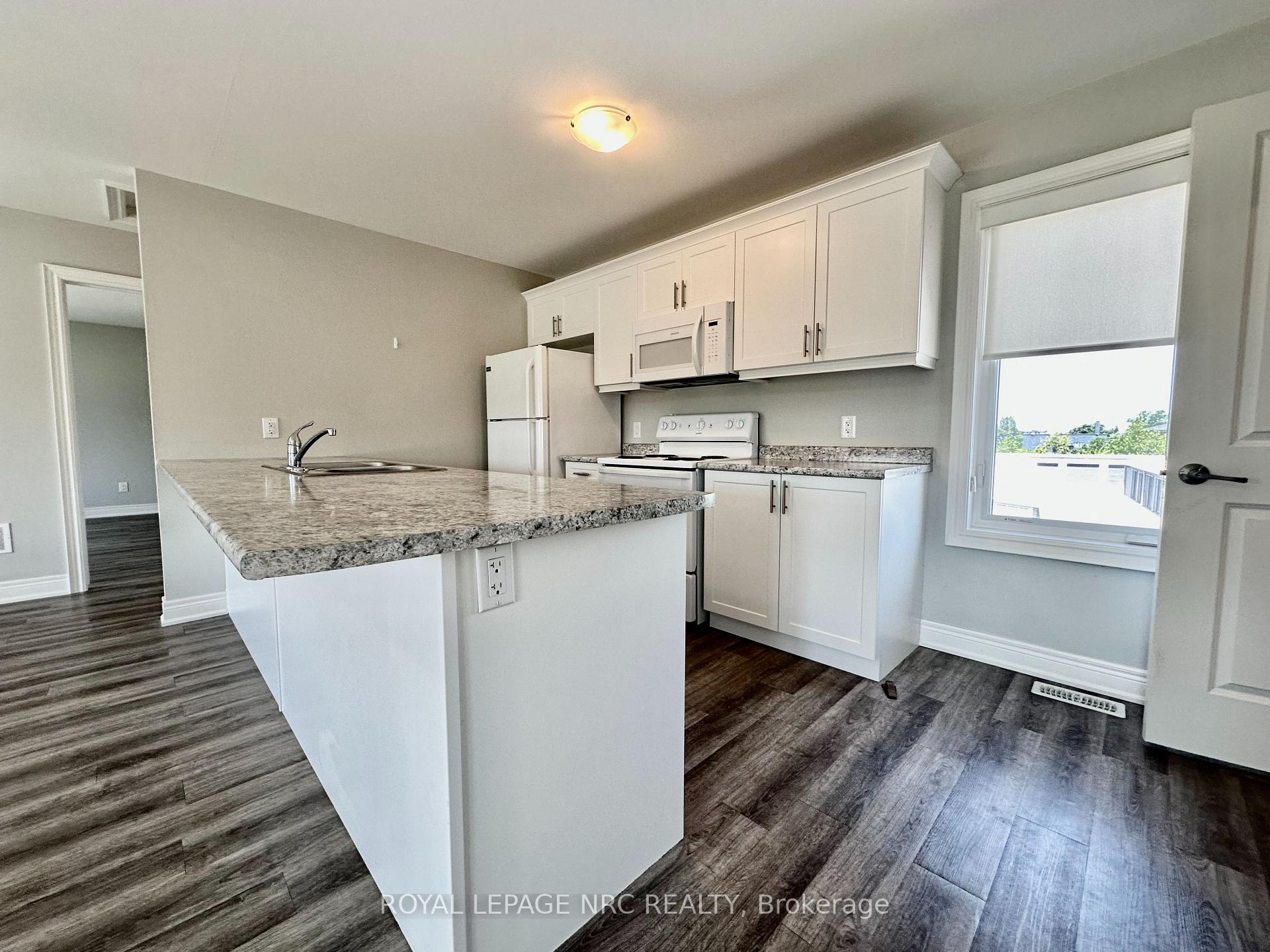 Photo 5 of Unit UPPER, 1 Abbot Street, St. Catharines, Oakdale — HOMEH