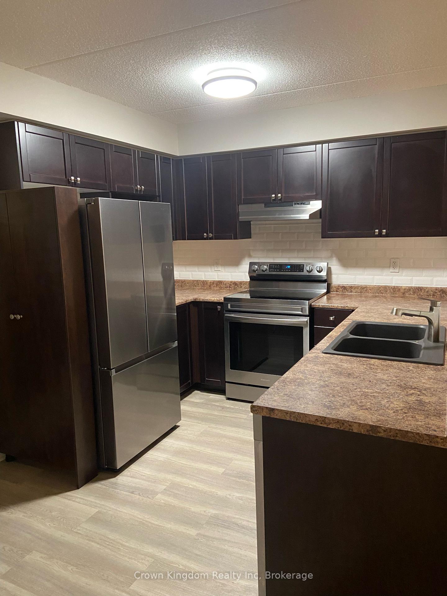 Photo 3 of Unit 212, 1360 Main Street E, Milton, Dempsey — HOMEH