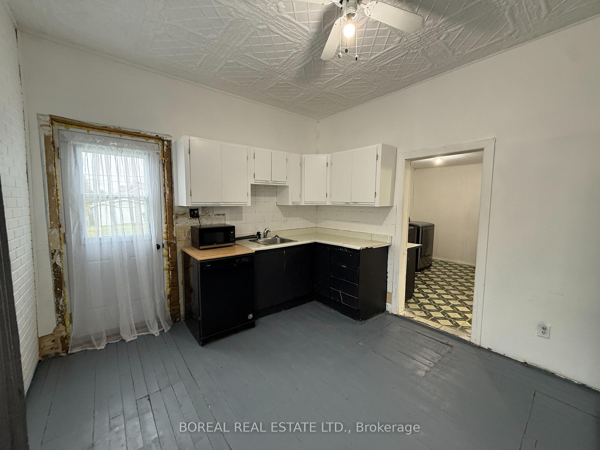 Photo 29 of 193 Twelfth Avenue, Cochrane — HOMEH