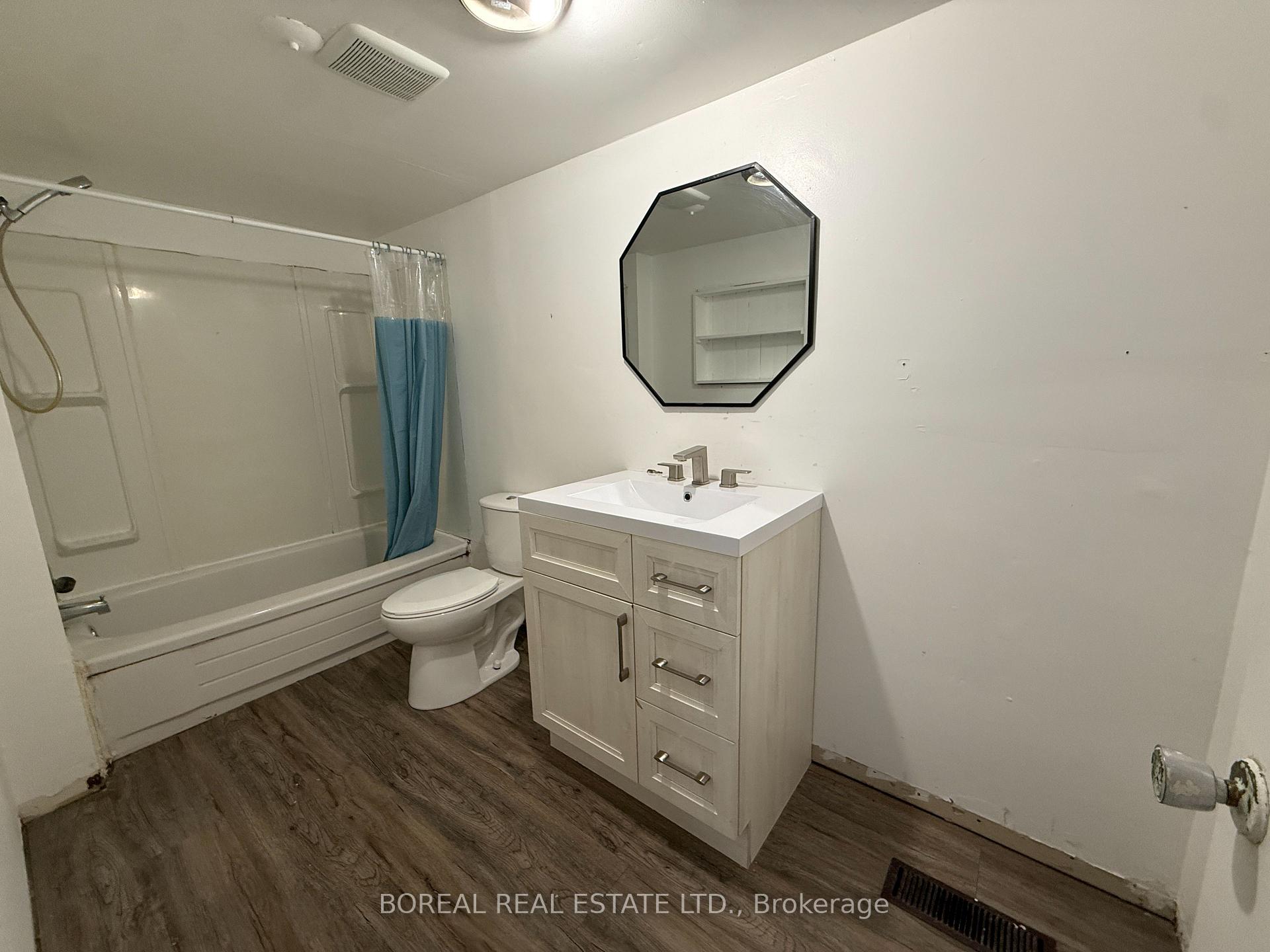 Photo 32 of 193 Twelfth Avenue, Cochrane — HOMEH