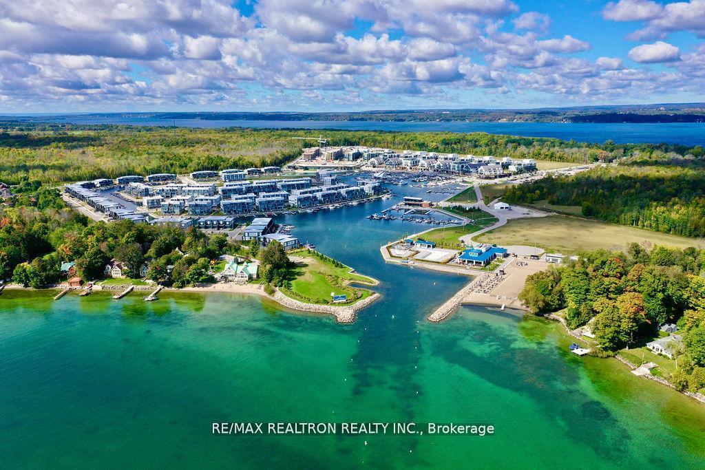 Photo 6 of Unit C404, 301 Sea Ray Avenue, Innisfil, Rural Innisfil — HOMEH