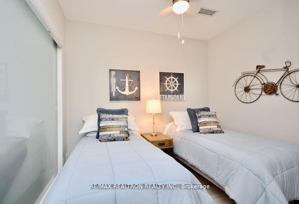 Photo 13 of Unit C404, 301 Sea Ray Avenue, Innisfil, Rural Innisfil — HOMEH