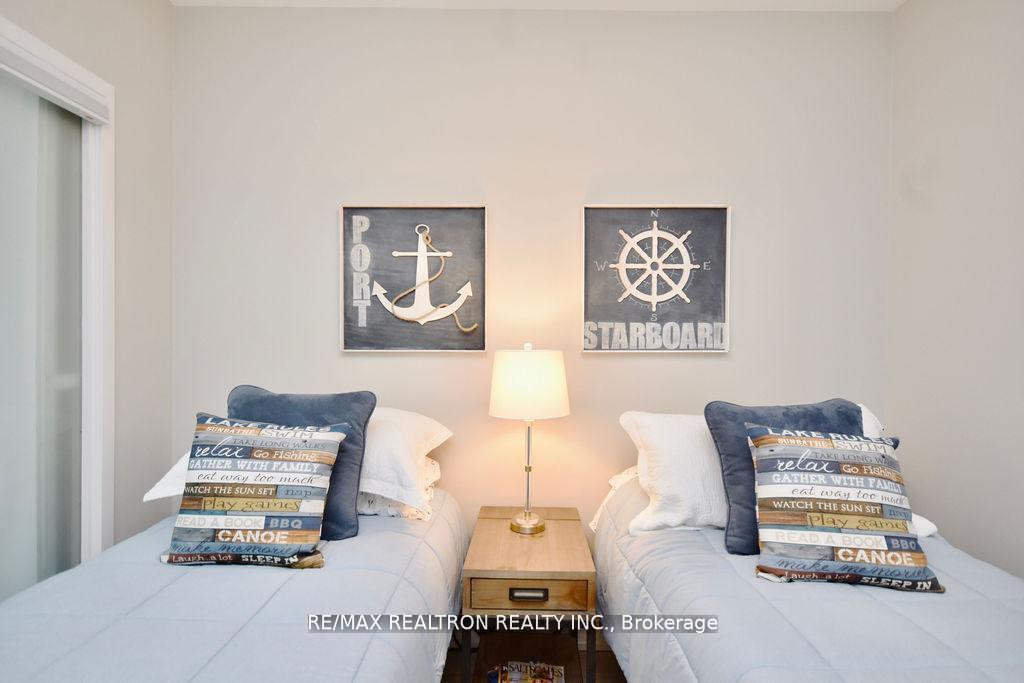 Photo 14 of Unit C404, 301 Sea Ray Avenue, Innisfil, Rural Innisfil — HOMEH