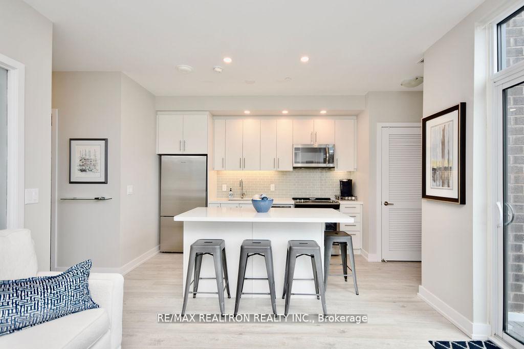Photo 23 of Unit C404, 301 Sea Ray Avenue, Innisfil, Rural Innisfil — HOMEH