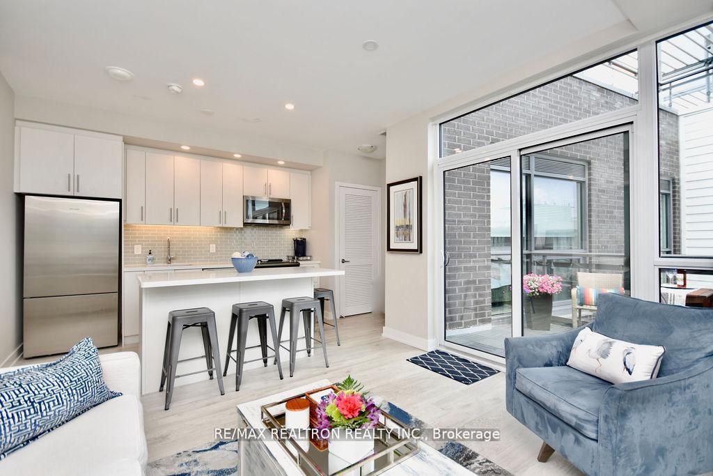 Photo 24 of Unit C404, 301 Sea Ray Avenue, Innisfil, Rural Innisfil — HOMEH