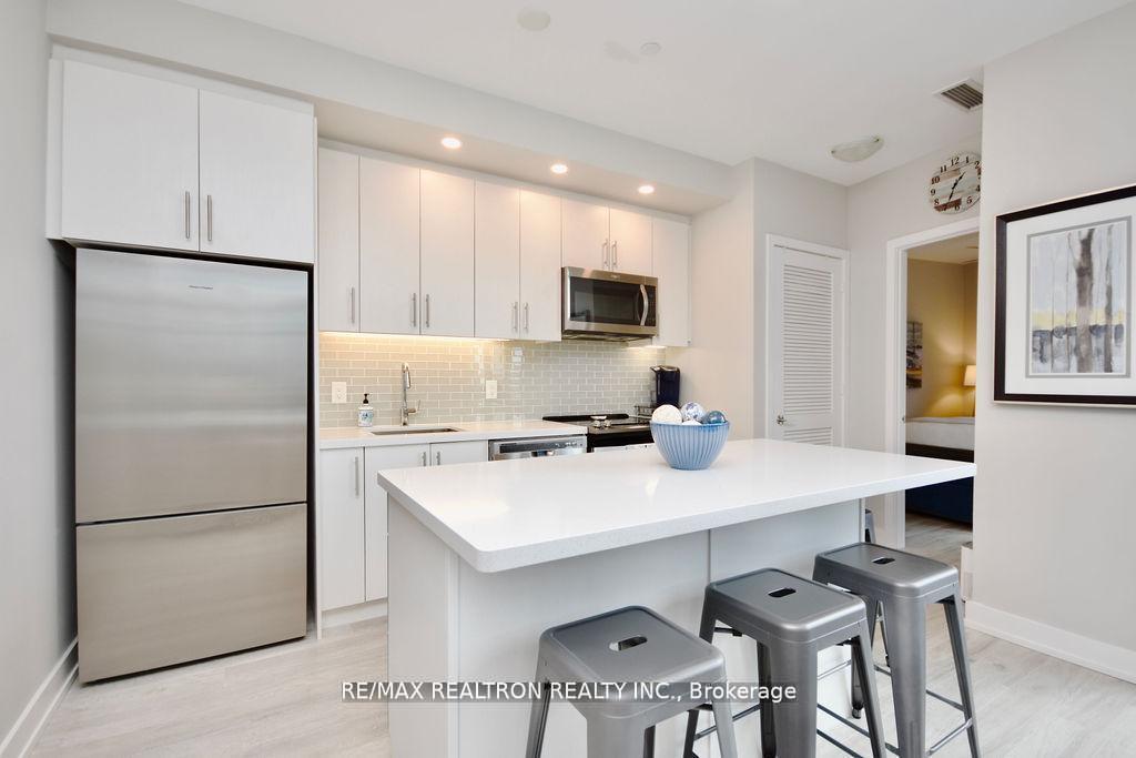 Photo 28 of Unit C404, 301 Sea Ray Avenue, Innisfil, Rural Innisfil — HOMEH