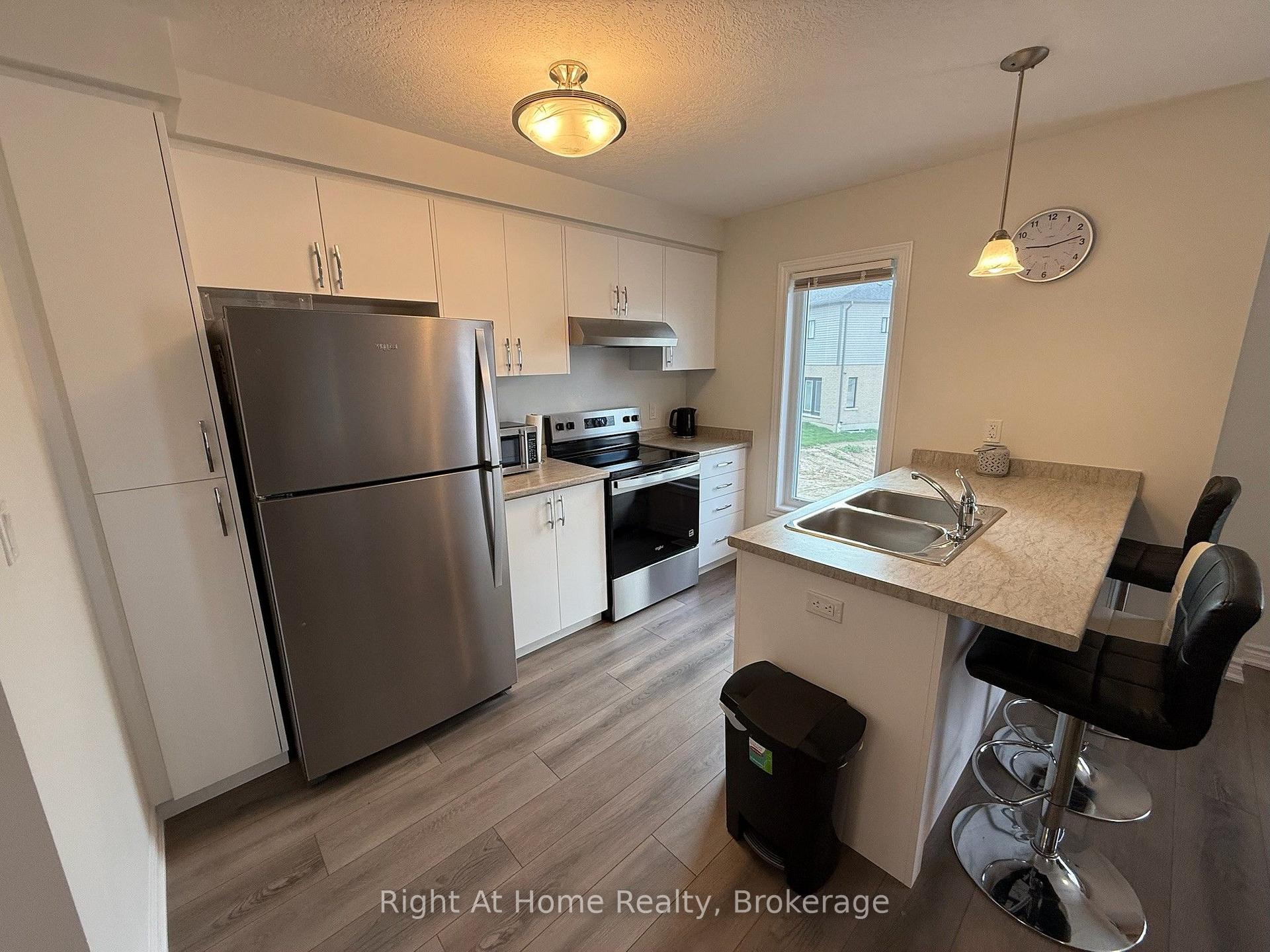Photo 5 of Unit Upper, 217 Benninger Drive, Kitchener — HOMEH