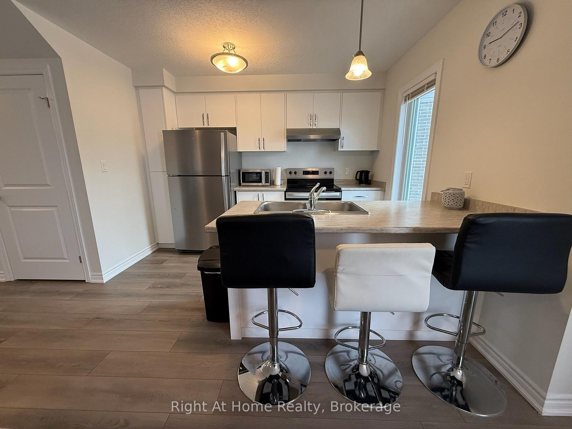 Photo 7 of Unit Upper, 217 Benninger Drive, Kitchener — HOMEH