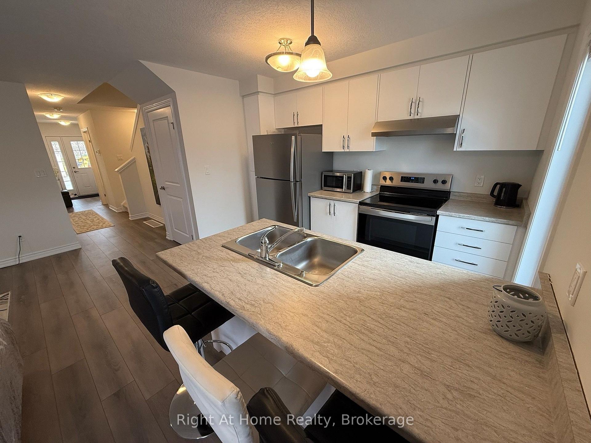 Photo 10 of Unit Upper, 217 Benninger Drive, Kitchener — HOMEH