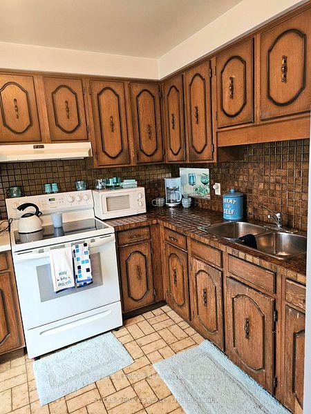 Photo 3 of Unit 1, 5815 Swayze Drive, Niagara Falls, Church's Lane — HOMEH