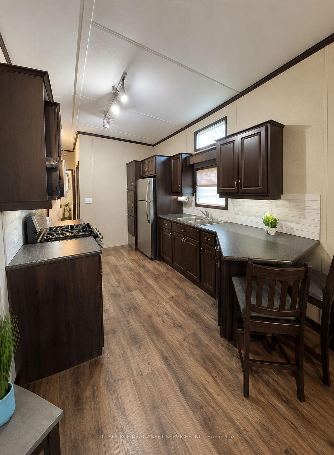 Photo 30 of Unit WCL-CT015, 15 Chippewa Trail, Wasaga Beach — HOMEH