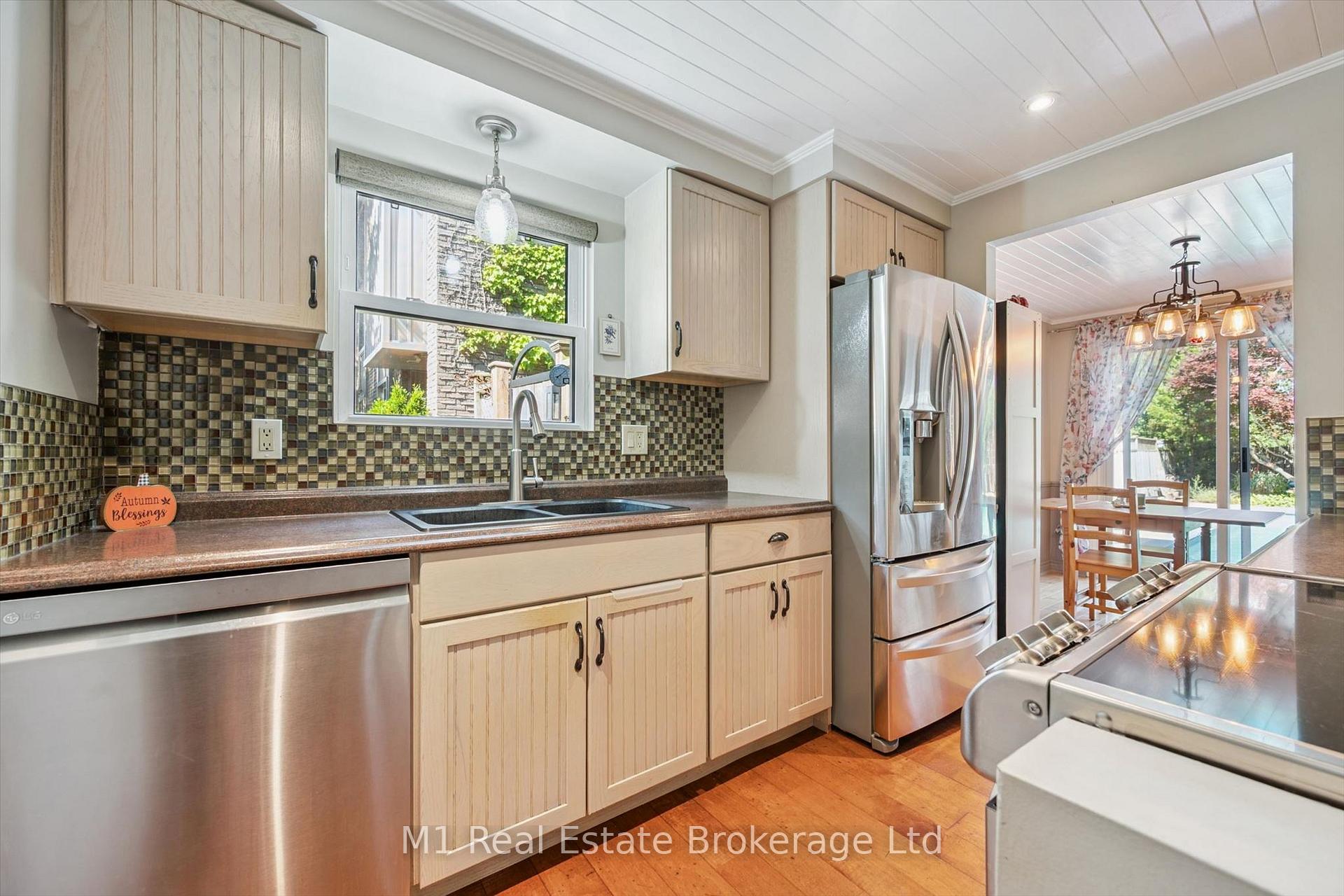 Photo 1 of 567 Willow Road, Guelph, Willow West/Sugarbush/West Acres — HOMEH