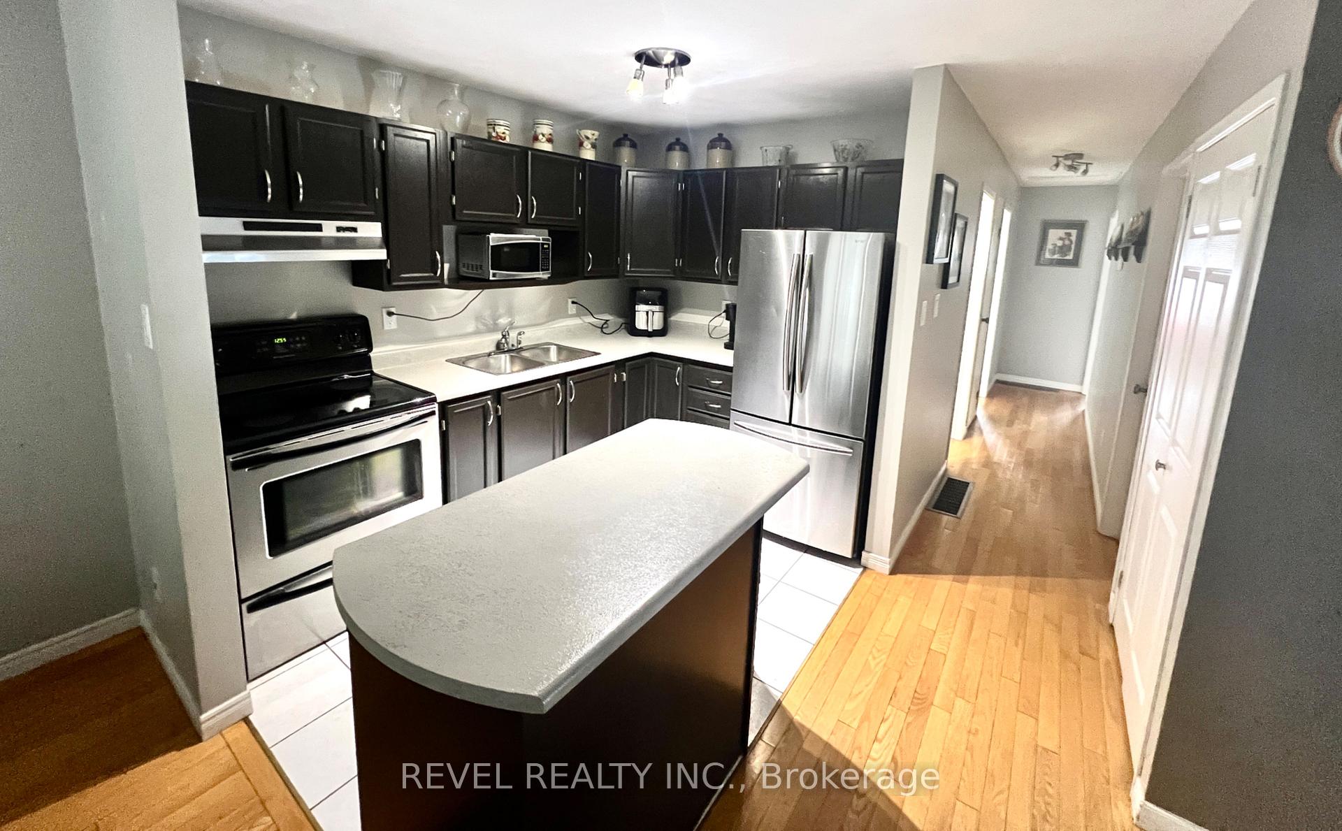 Photo 11 of 434 Lonergan Boulevard, Timmins, TNW - Riverpark — HOMEH