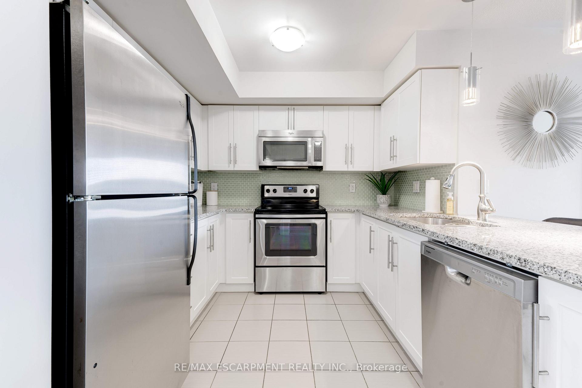 Photo 4 of Unit 406, 1045 Nadalin Heights, Milton, Willmott — HOMEH
