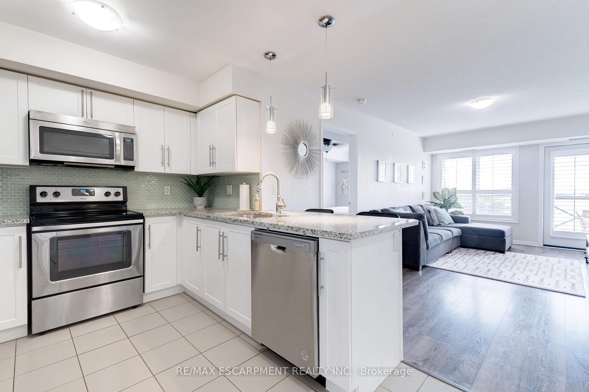 Photo 6 of Unit 406, 1045 Nadalin Heights, Milton, Willmott — HOMEH