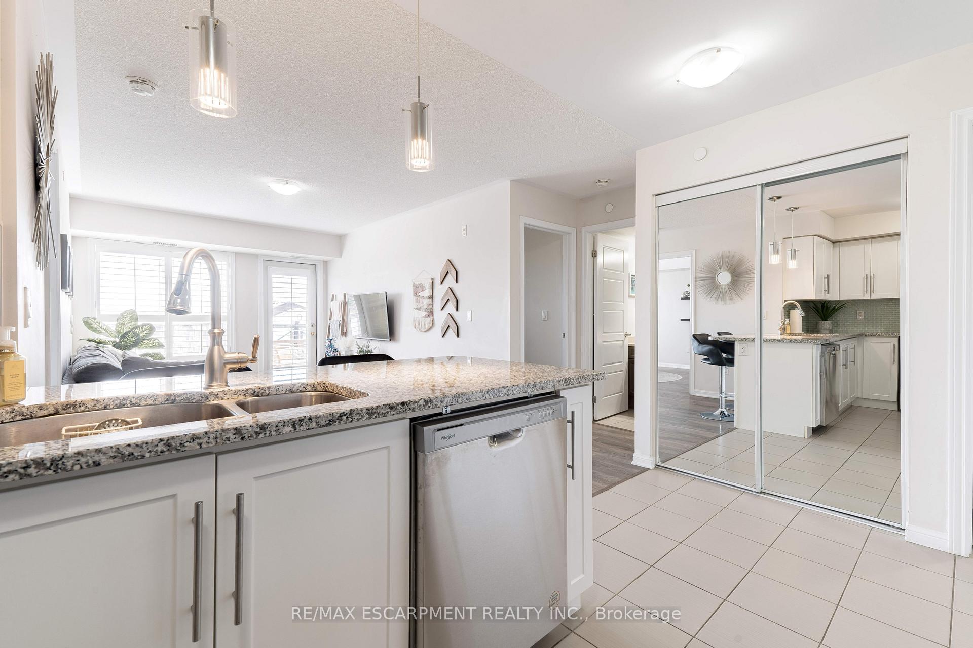 Photo 7 of Unit 406, 1045 Nadalin Heights, Milton, Willmott — HOMEH