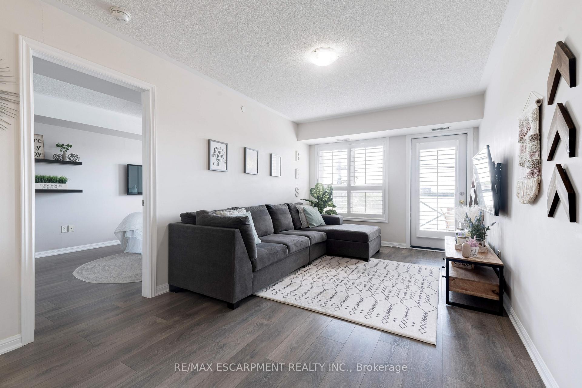 Photo 10 of Unit 406, 1045 Nadalin Heights, Milton, Willmott — HOMEH