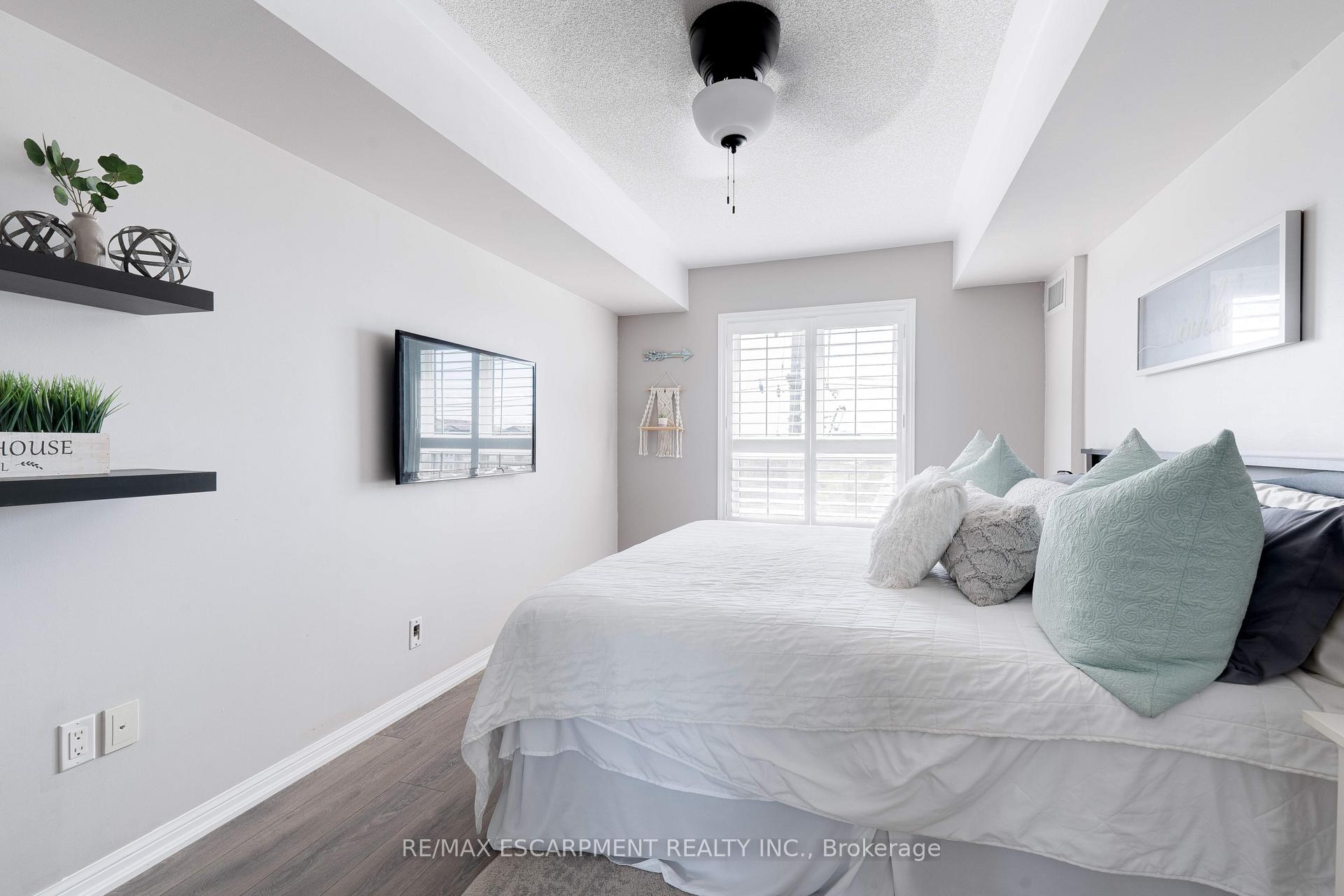 Photo 12 of Unit 406, 1045 Nadalin Heights, Milton, Willmott — HOMEH