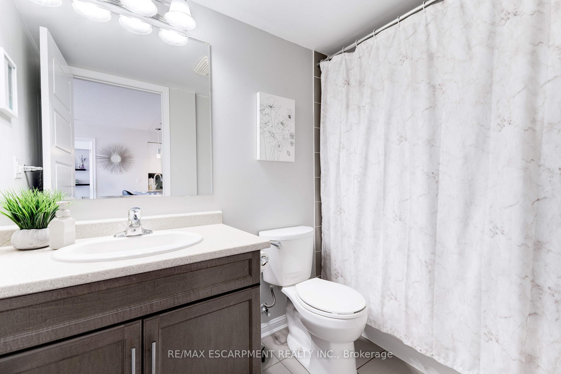 Photo 17 of Unit 406, 1045 Nadalin Heights, Milton, Willmott — HOMEH