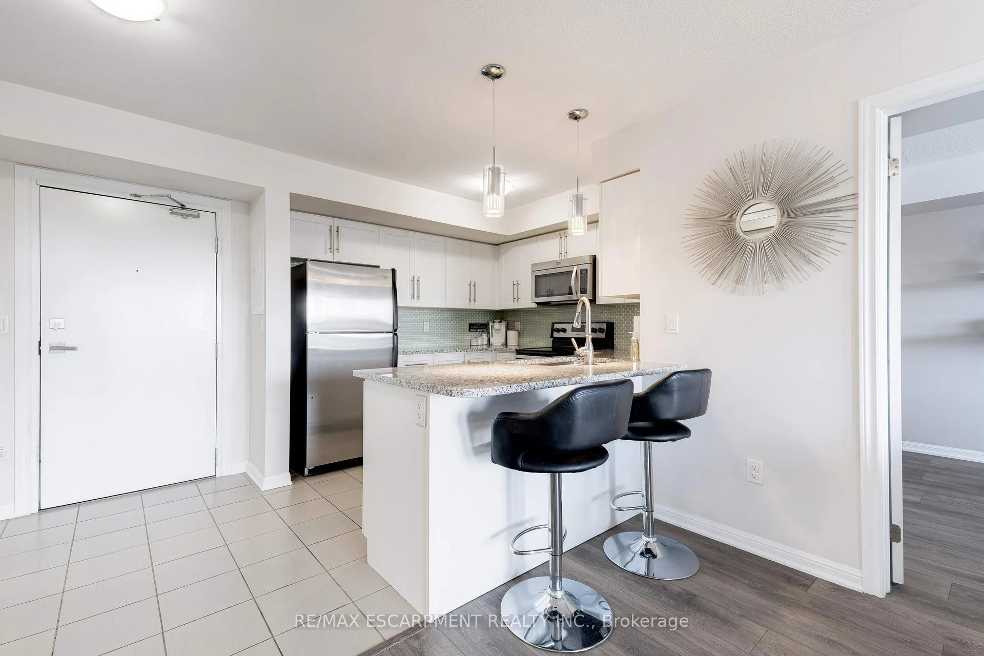 Photo 5 of Unit 406, 1045 Nadalin Heights, Milton, Willmott — HOMEH