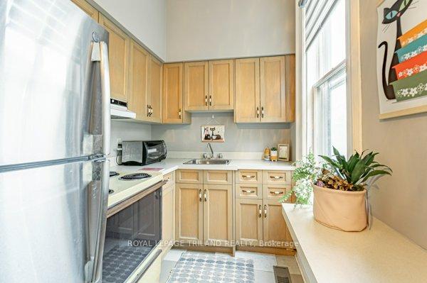 Photo 8 of 848 Dundas Street E, London, East G — HOMEH