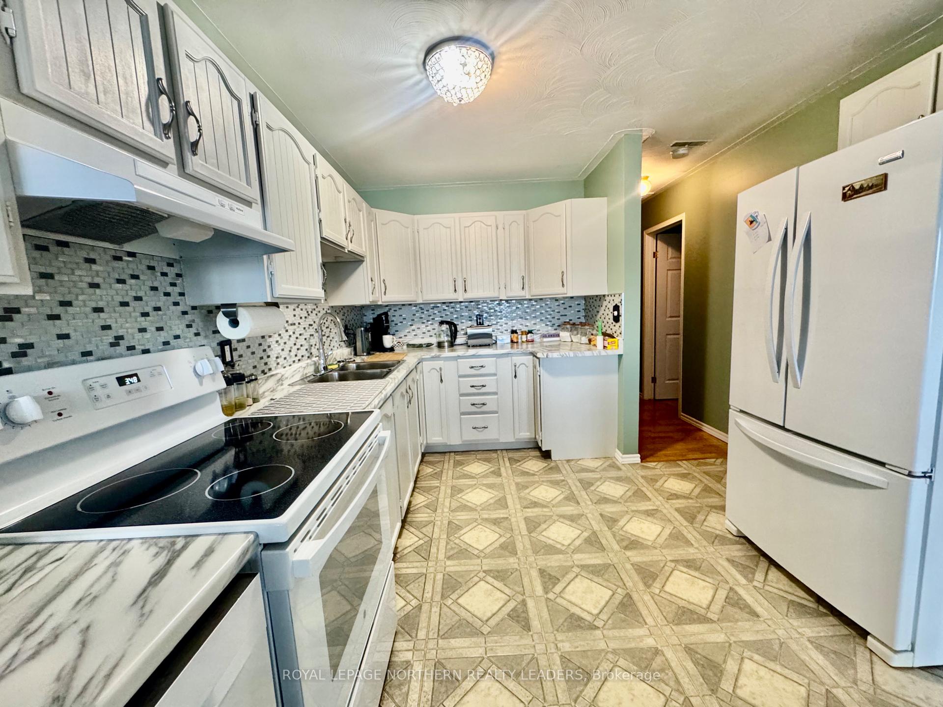 Photo 3 of 379 Lonergan Boulevard, Timmins, TNW - Riverpark — HOMEH