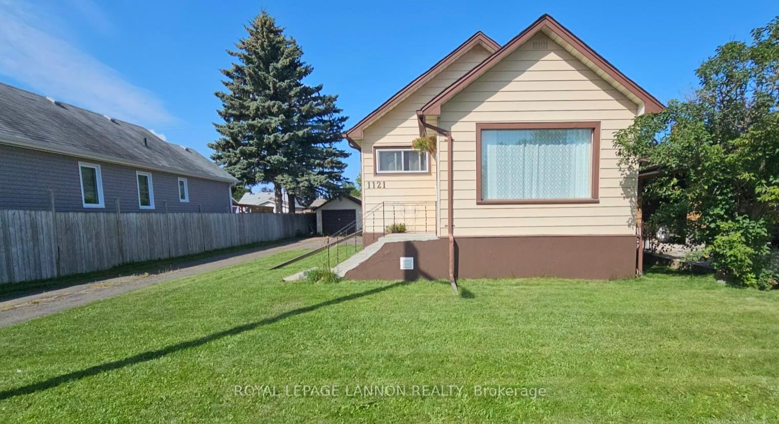 Photo 1 of 1121 Centre Avenue, Thunder Bay, Westfort — HOMEH