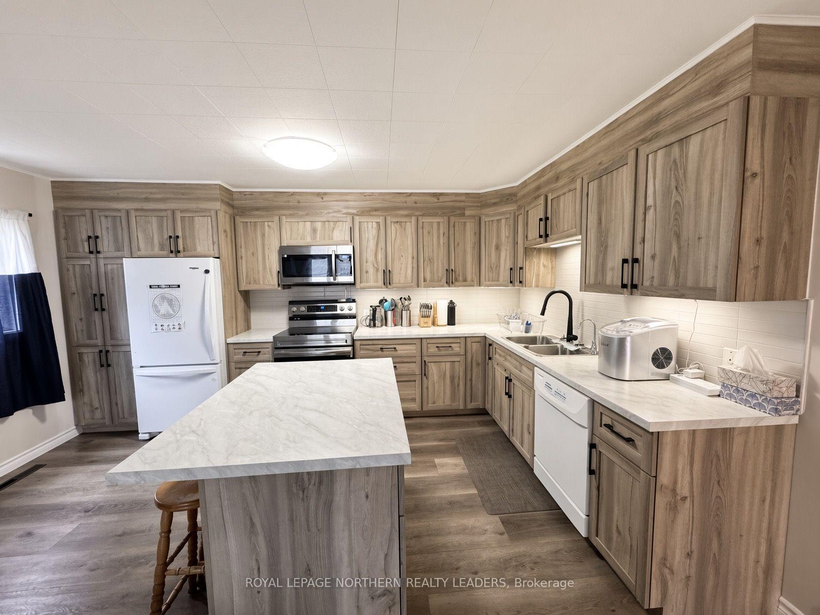 Photo 3 of 53 Columbus Avenue, Timmins, TS - SW — HOMEH
