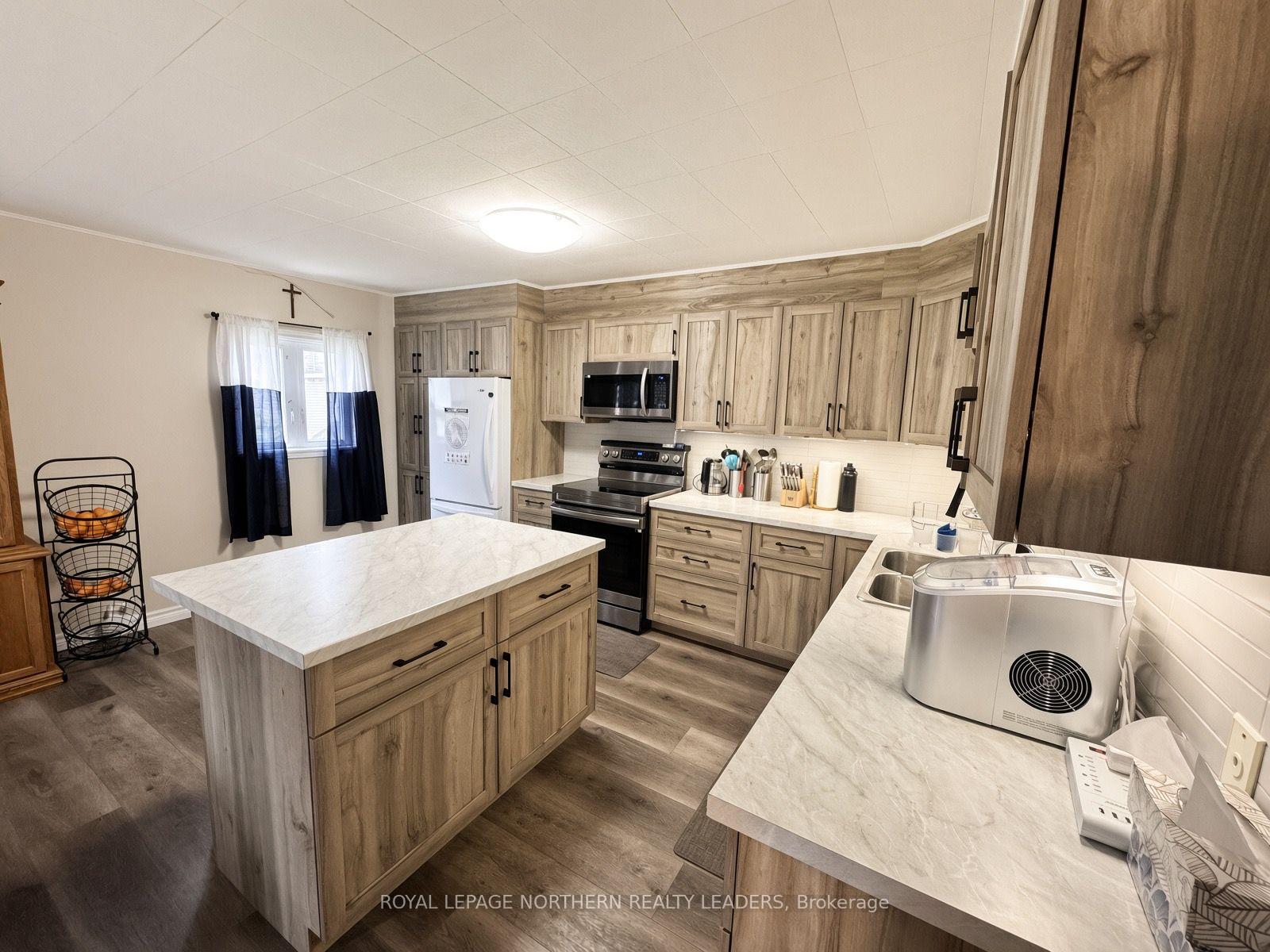 Photo 4 of 53 Columbus Avenue, Timmins, TS - SW — HOMEH