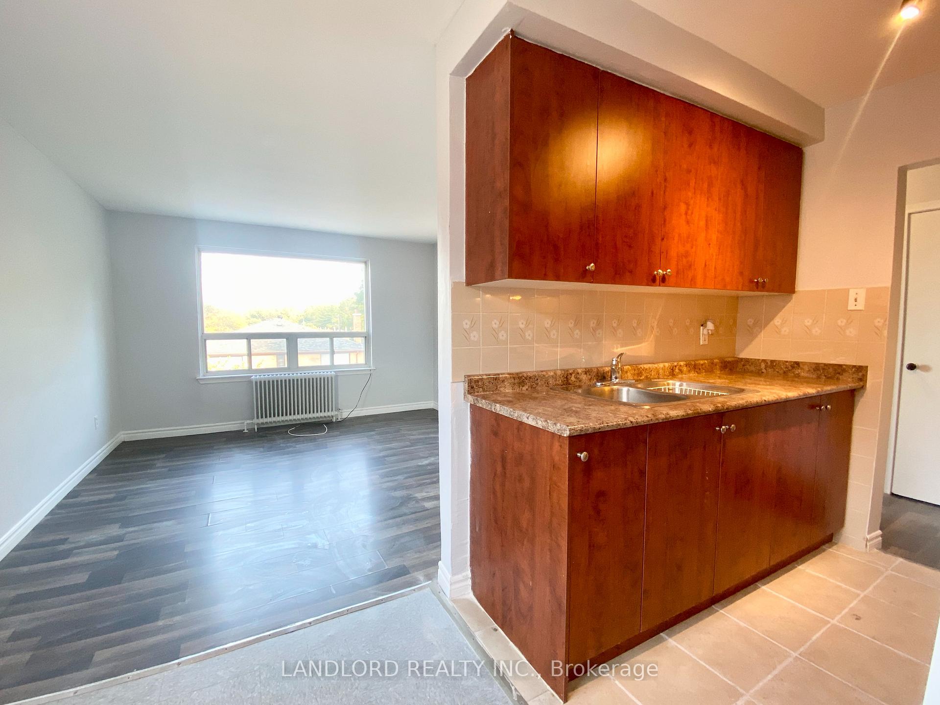 Photo 1 of Unit 4, 127 Scarlett Road, Toronto, Rockcliffe-Smythe — HOMEH