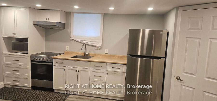 Photo 5 of Unit Bsmt, 21 Thomson Street, Barrie, Queen's Park — HOMEH