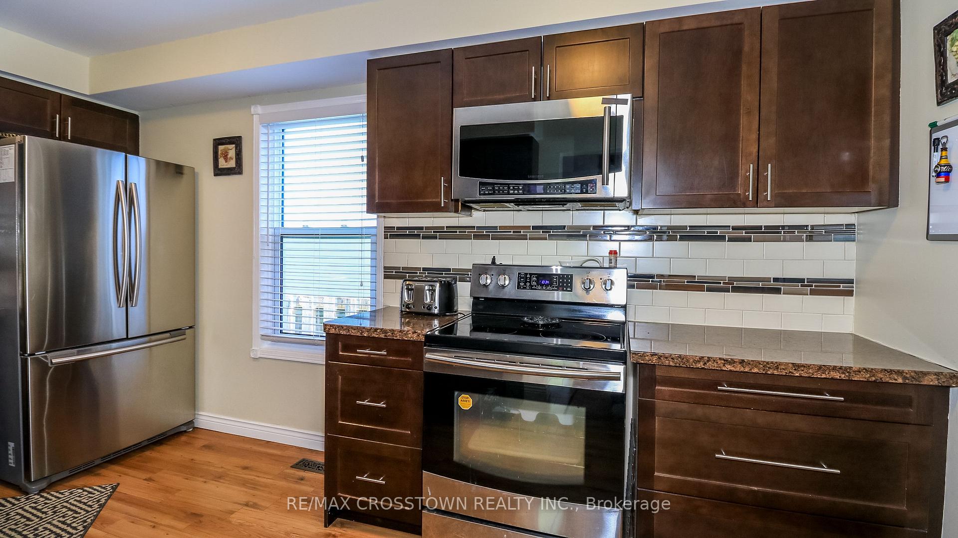 Photo 7 of 67 Donald Crescent, Wasaga Beach — HOMEH