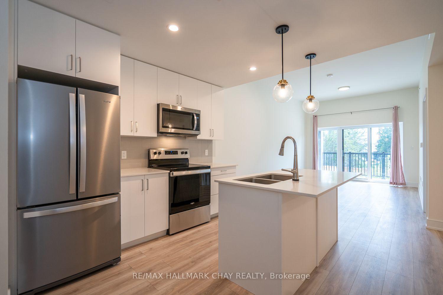 Photo 3 of Unit 203, 121 Mary Street, Clearview, Creemore — HOMEH