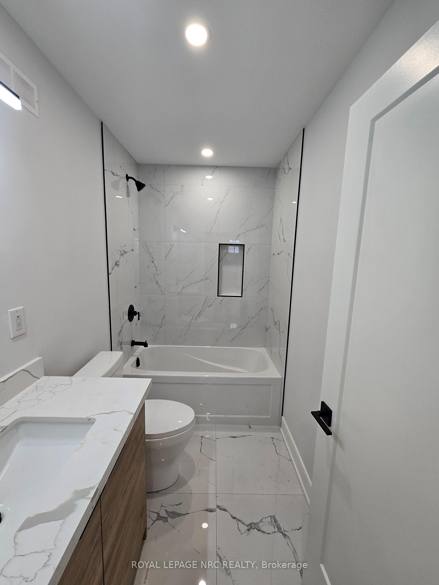 Photo 9 of Unit Lower, 7394 Splendour Drive, Niagara Falls, Brown — HOMEH