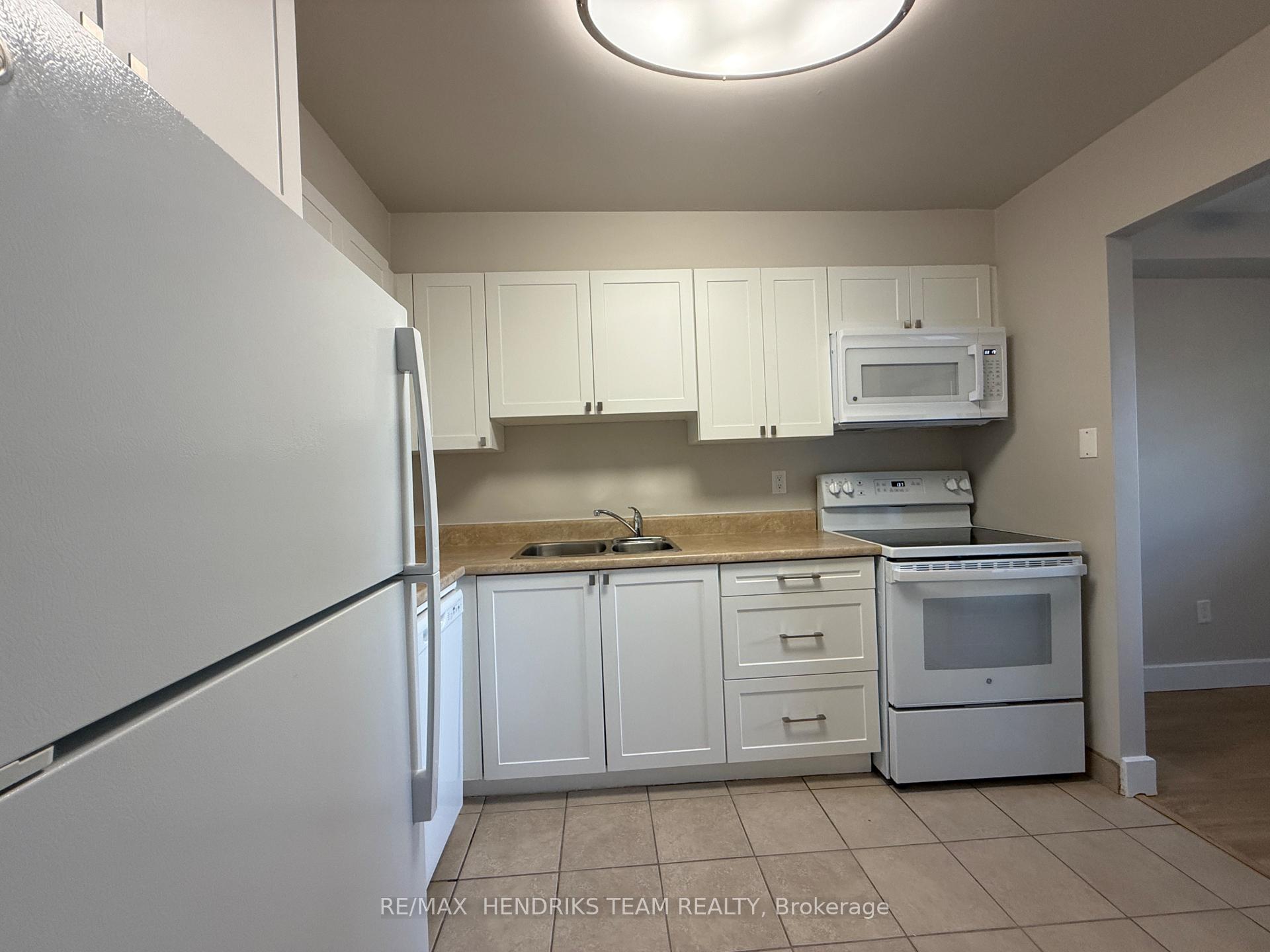 Photo 2 of Unit 302, 4982 Chrysler Avenue, Niagara Falls, Downtown — HOMEH