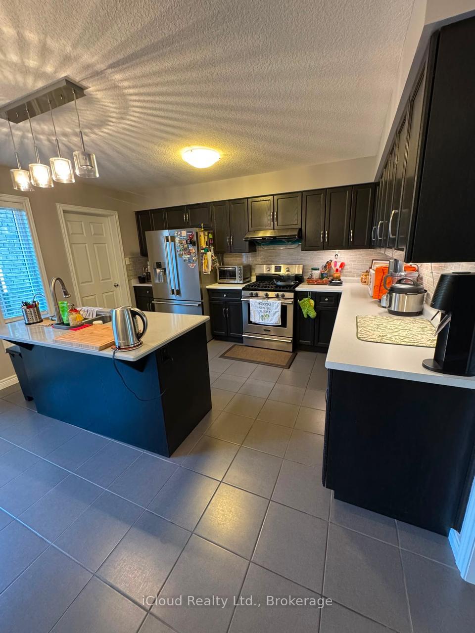 Photo 9 of Unit 29, 14 Amos Drive, Guelph, Kortright Hills — HOMEH