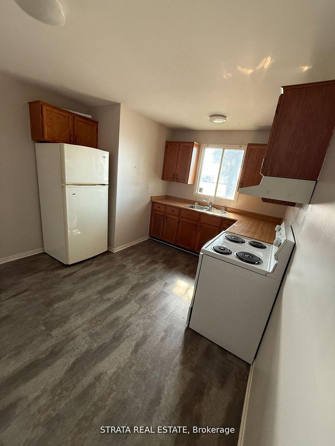 Photo 4 of Unit 1, 338 Malaga Road, Oshawa, Lakeview — HOMEH