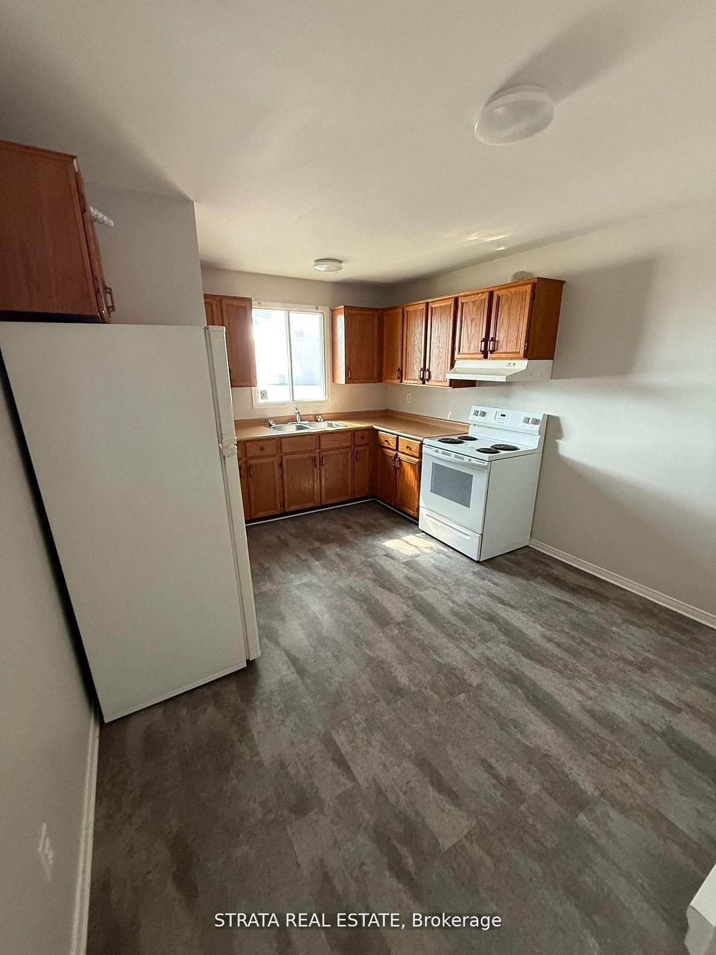 Photo 5 of Unit 1, 338 Malaga Road, Oshawa, Lakeview — HOMEH