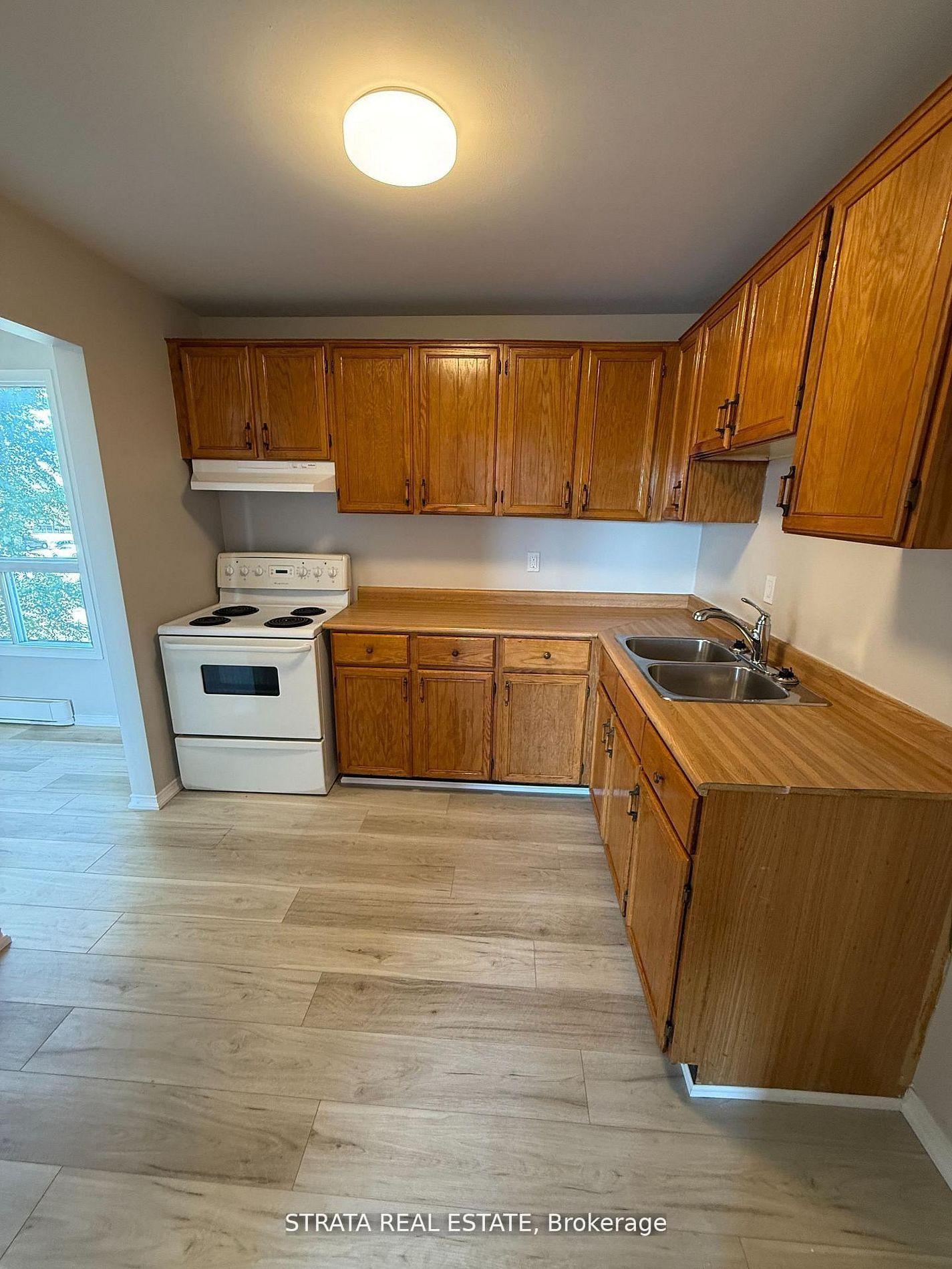 Photo 6 of Unit 1, 338 Malaga Road, Oshawa, Lakeview — HOMEH