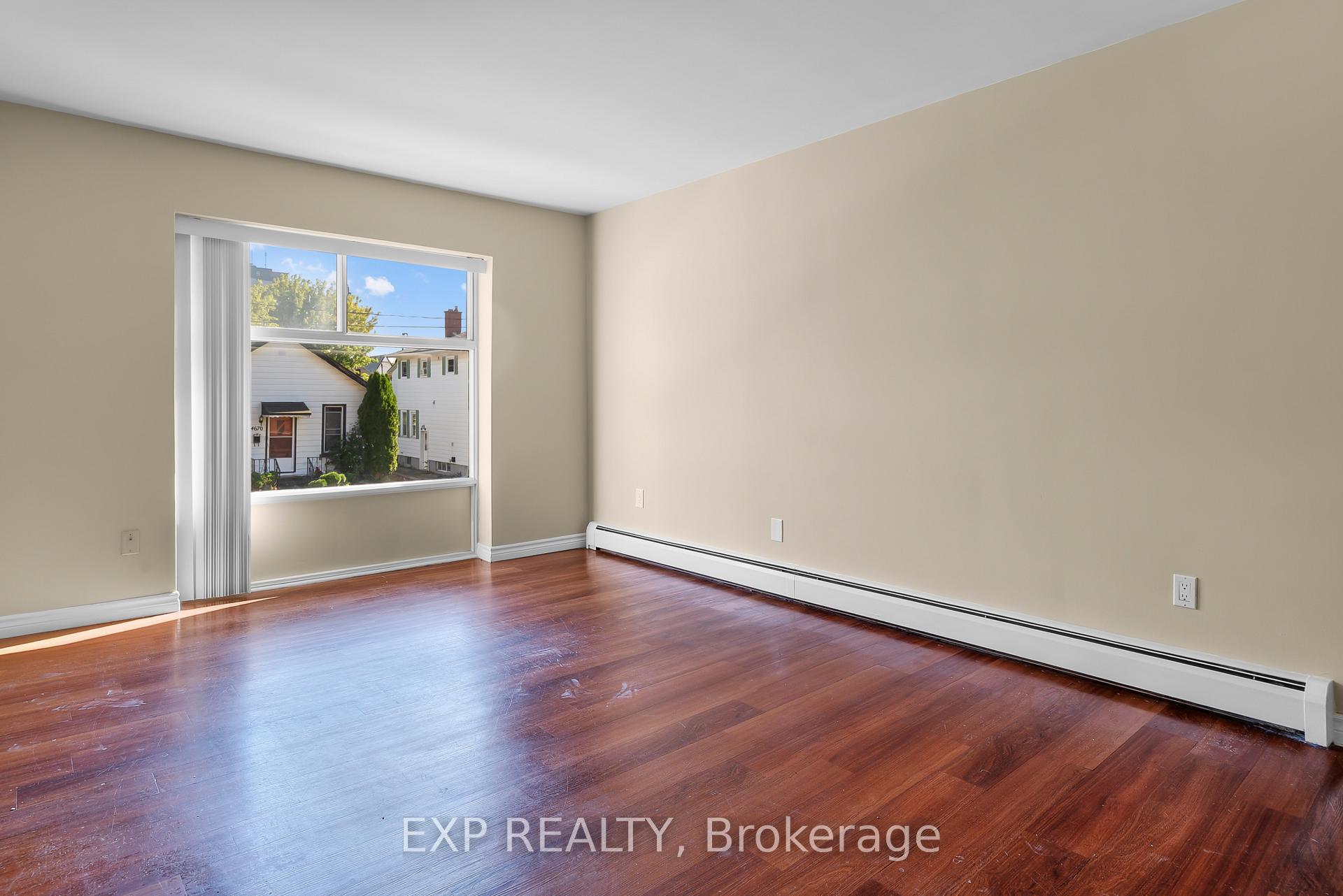 Photo 5 of Unit 5, 4663 Huron Street, Niagara Falls, Downtown — HOMEH