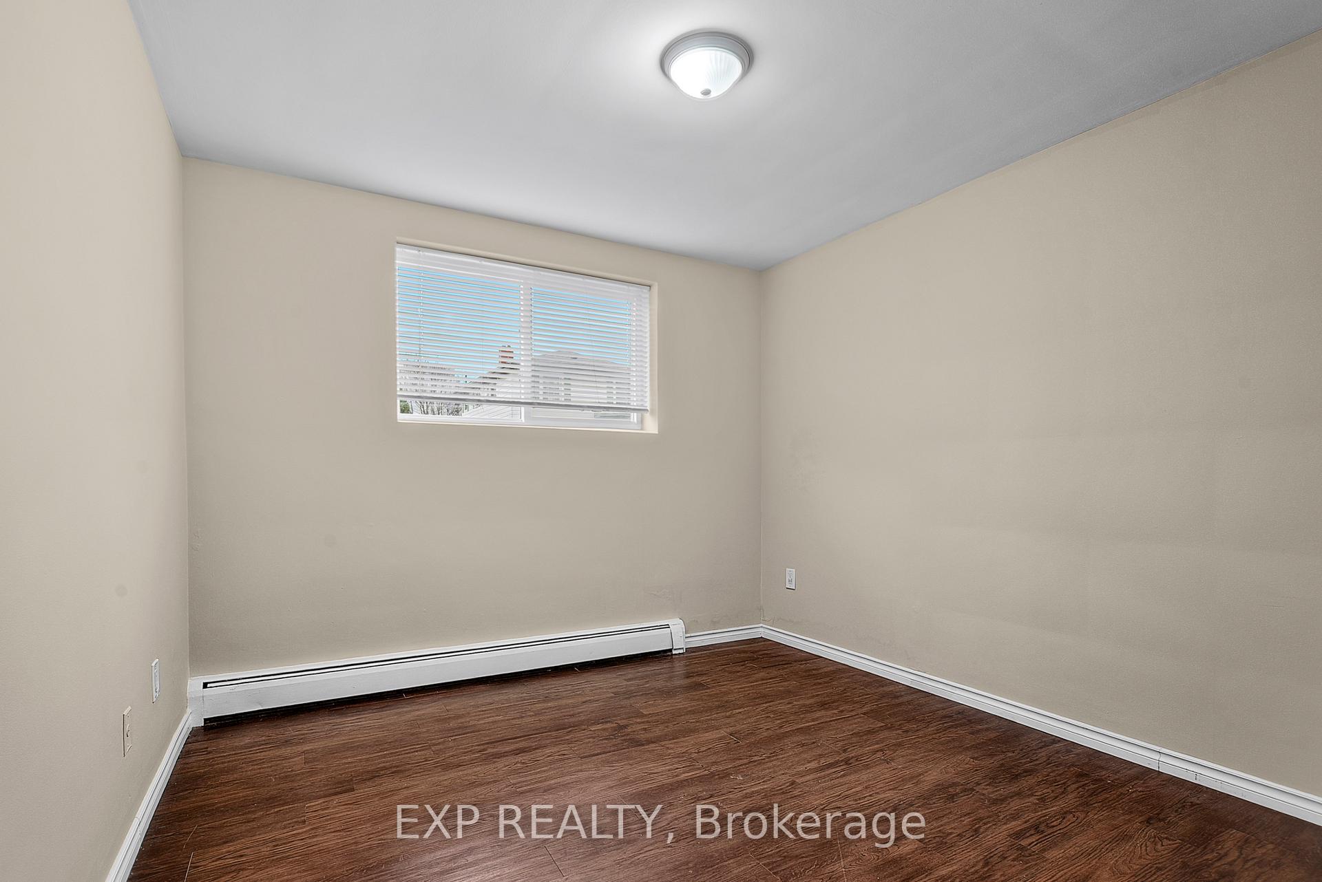 Photo 7 of Unit 1, 4663 Huron Street, Niagara Falls, Downtown — HOMEH