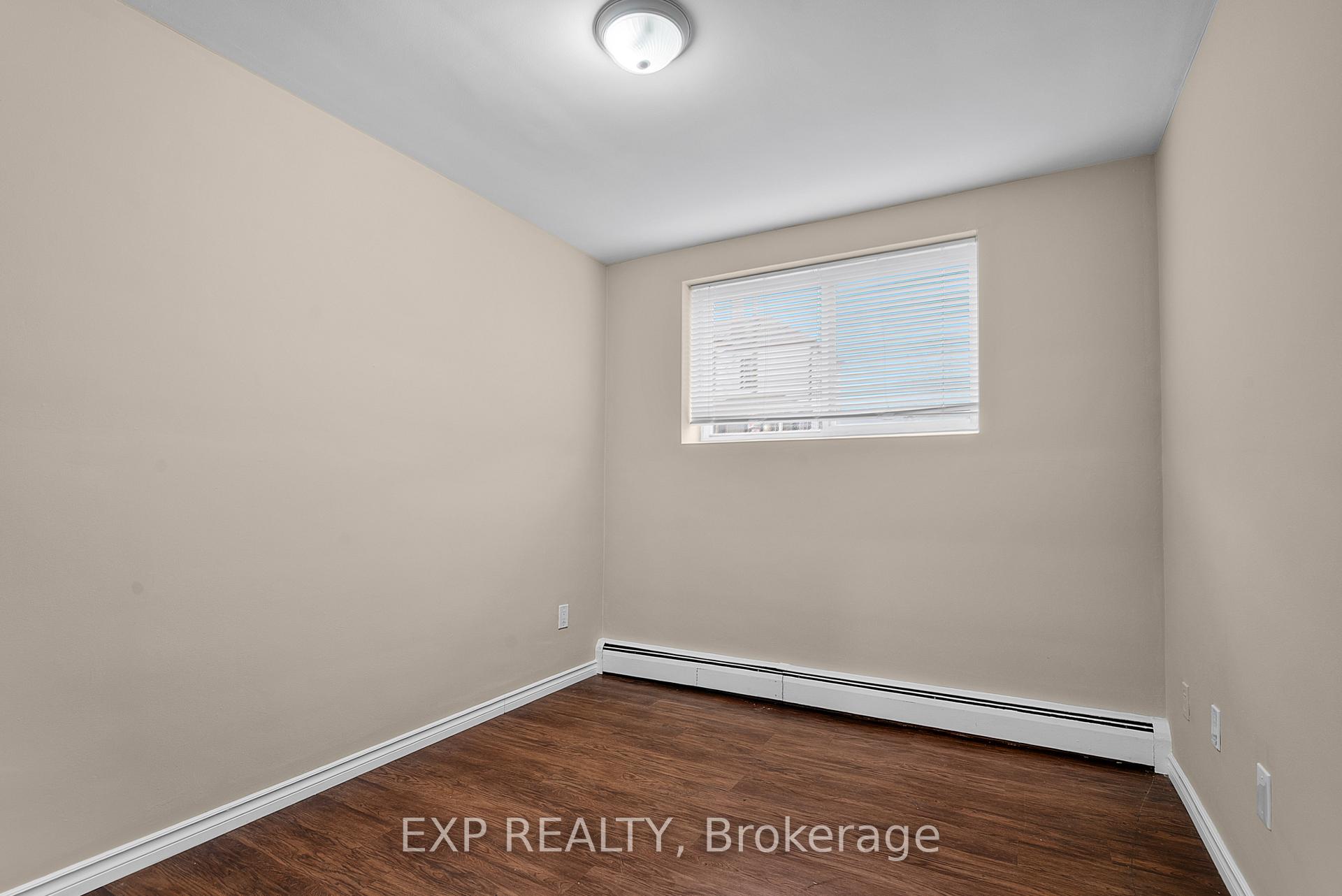 Photo 8 of Unit 1, 4663 Huron Street, Niagara Falls, Downtown — HOMEH