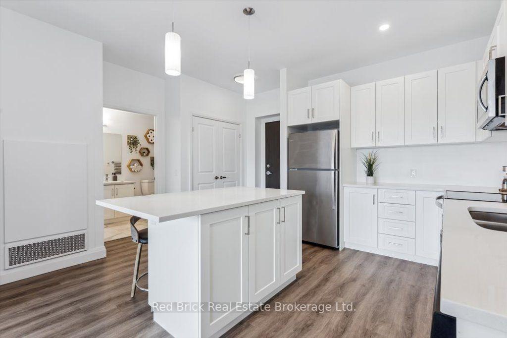 Photo 10 of Unit 403, 332 Gosling Gardens, Guelph, Clairfields/Hanlon Business Park — HOMEH