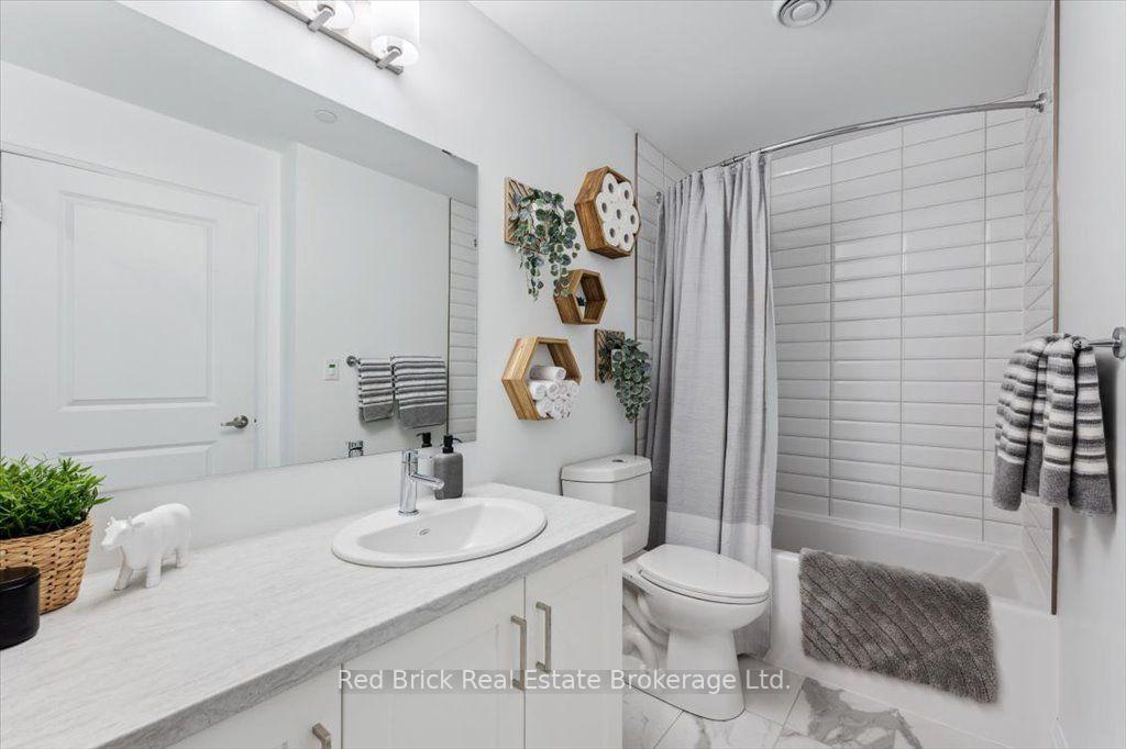 Photo 21 of Unit 403, 332 Gosling Gardens, Guelph, Clairfields/Hanlon Business Park — HOMEH