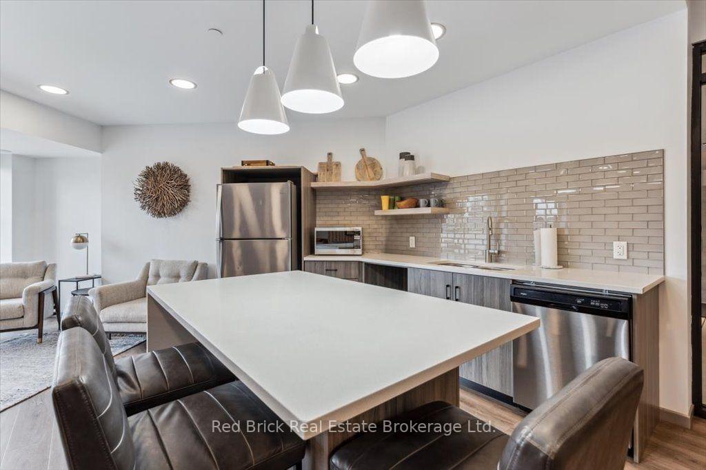 Photo 32 of Unit 403, 332 Gosling Gardens, Guelph, Clairfields/Hanlon Business Park — HOMEH