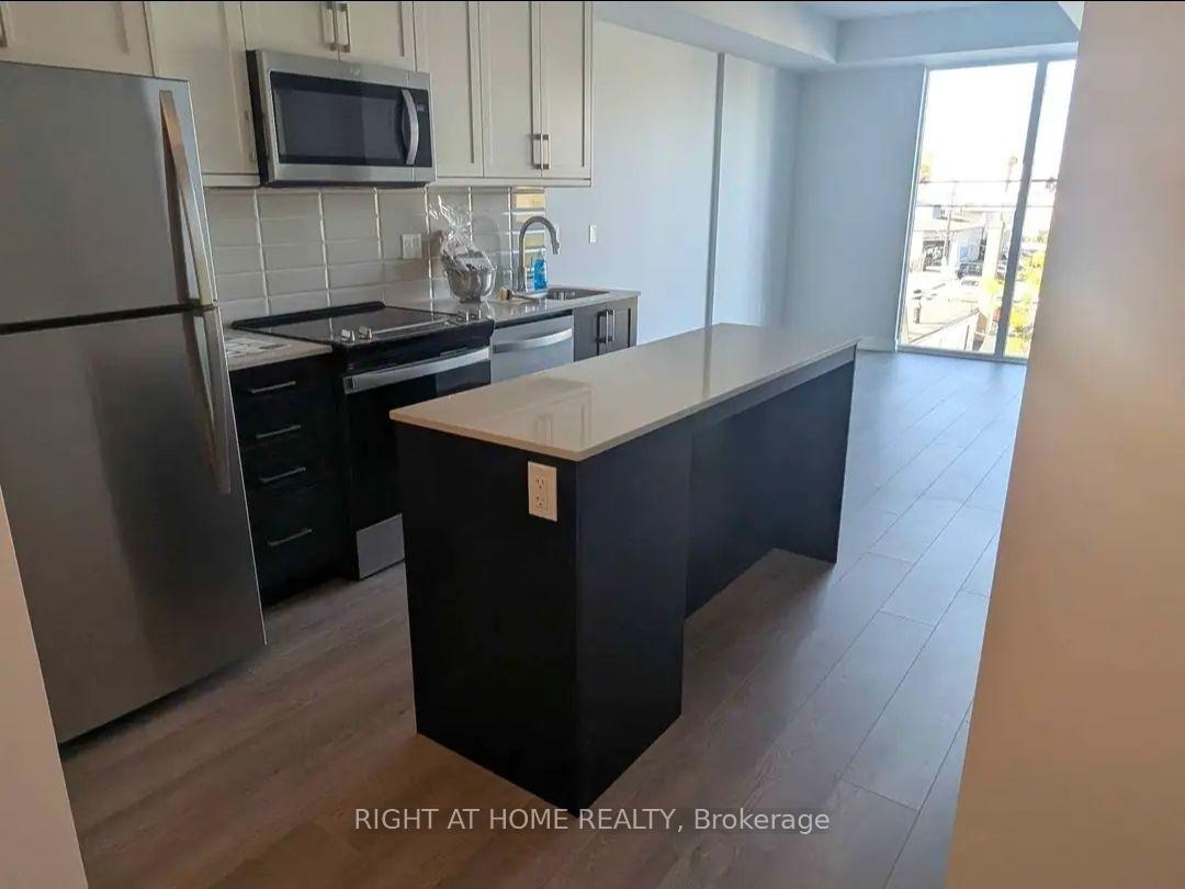 Photo 10 of Unit 211, 201 Brock Street S, Whitby, Downtown Whitby — HOMEH
